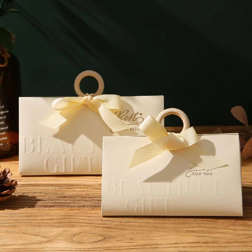 Custom printed gift bag with ribbon handle paper packaging